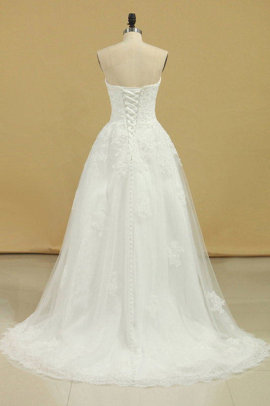 2024 Wedding Dresses Strapless Tulle With Applique A Line Court Train